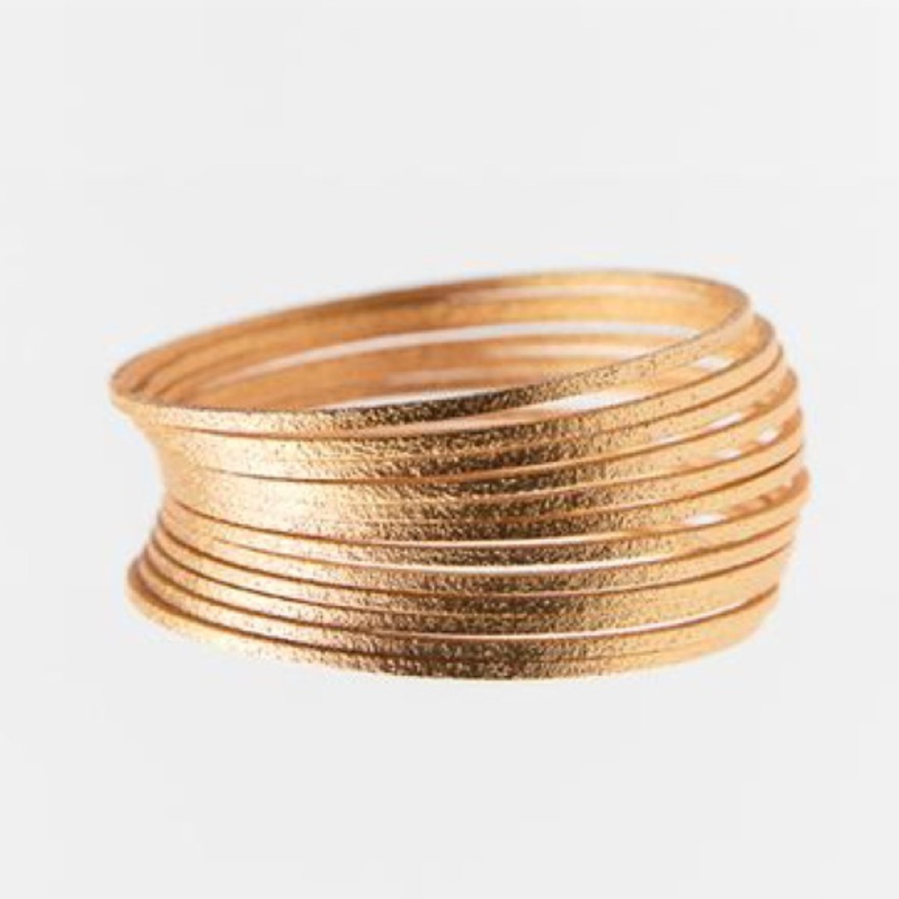 NWT. Zara Golden Pack of Multiple Textured Metal Bracelets.
